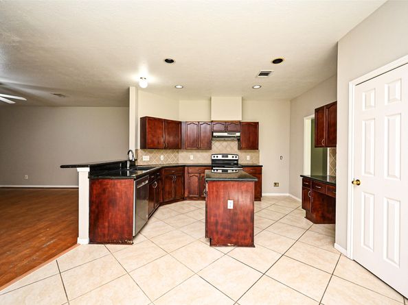 219 Rolling Plains Drive, Sugar Land TX 77479