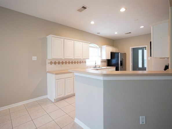 105 N Hollylaurel Circle, The Woodlands TX 77382