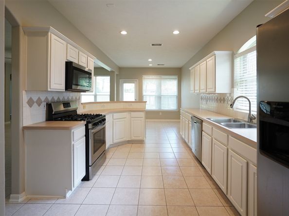 105 N Hollylaurel Circle, The Woodlands TX 77382