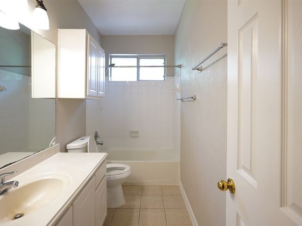 105 N Hollylaurel Circle, The Woodlands TX 77382