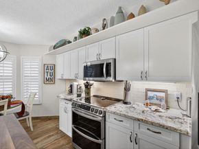 221 Canterbury Drive W, Palm Beach Gardens FL 33418