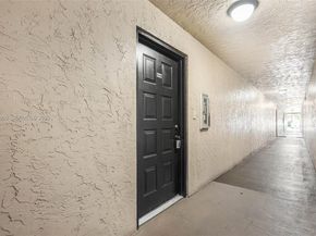 8721 Wiles Road 105, Coral Springs FL 33067