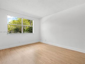 8721 Wiles Road 105, Coral Springs FL 33067