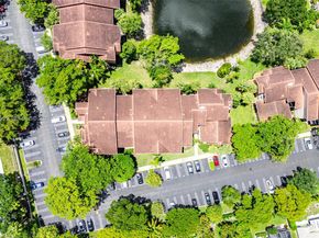 8721 Wiles Road 105, Coral Springs FL 33067