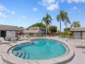 419 Pine Tree Court 21, Atlantis FL 33462