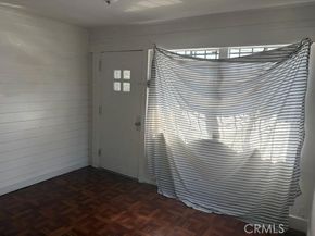 1413 E 77th Street, Los Angeles CA 90001