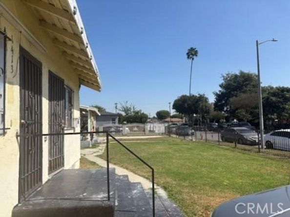 1413 E 77th Street, Los Angeles CA 90001