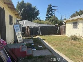 1413 E 77th Street, Los Angeles CA 90001