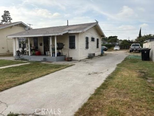 1413 E 77th Street, Los Angeles CA 90001