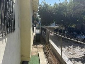 1413 E 77th Street, Los Angeles CA 90001