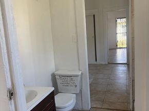 1413 E 77th Street, Los Angeles CA 90001