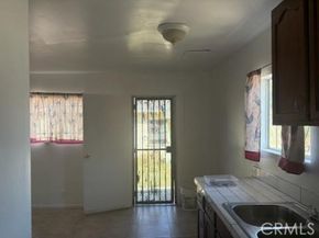 1413 E 77th Street, Los Angeles CA 90001