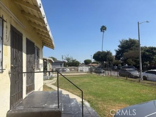 1413 E 77th Street, Los Angeles CA 90001