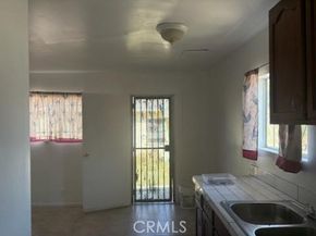 1413 E 77th Street, Los Angeles CA 90001