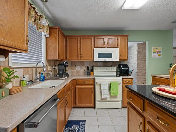 9112 Hazelhurst DR, Austin TX 78729