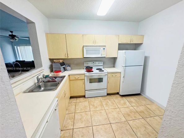 1169 Golden Lakes Blvd 1123, West Palm Beach FL 33411