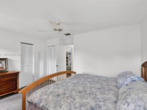 6310 Tall Cypress Cir, Green Acres FL 33463