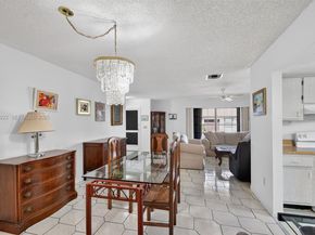 6310 Tall Cypress Cir, Green Acres FL 33463