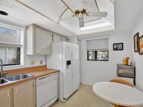 6310 Tall Cypress Cir, Green Acres FL 33463