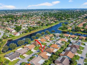 6310 Tall Cypress Cir, Green Acres FL 33463