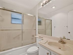 6310 Tall Cypress Cir, Green Acres FL 33463