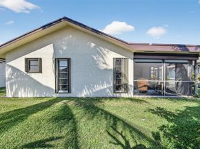 6310 Tall Cypress Cir, Green Acres FL 33463