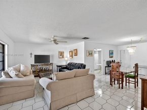 6310 Tall Cypress Cir, Green Acres FL 33463