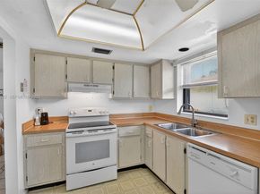 6310 Tall Cypress Cir, Green Acres FL 33463