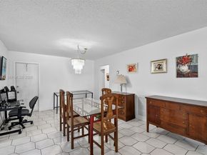 6310 Tall Cypress Cir, Green Acres FL 33463