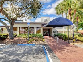 6310 Tall Cypress Cir, Green Acres FL 33463