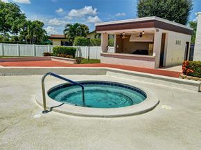 6310 Tall Cypress Cir, Green Acres FL 33463