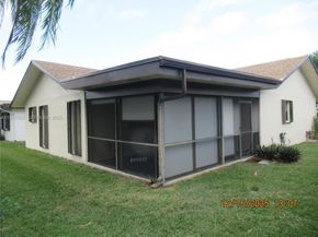 6310 Tall Cypress Cir, Green Acres FL 33463