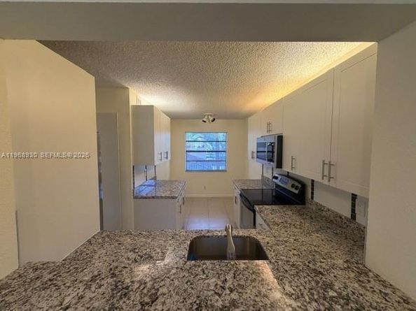 2071 Coral Ridge Dr N204, Coral Springs FL 33071