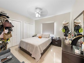 9621 W Calusa Club Dr, Miami FL 33186