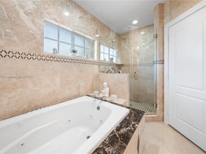 9621 W Calusa Club Dr, Miami FL 33186