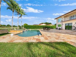 9621 W Calusa Club Dr, Miami FL 33186
