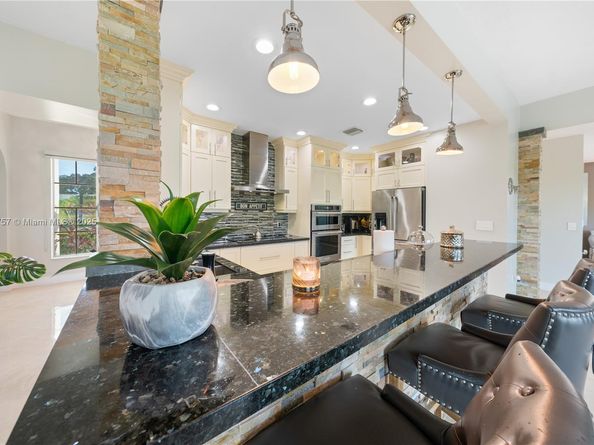 9621 W Calusa Club Dr, Miami FL 33186