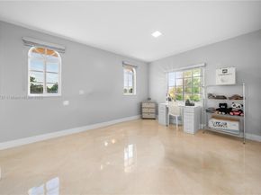 9621 W Calusa Club Dr, Miami FL 33186