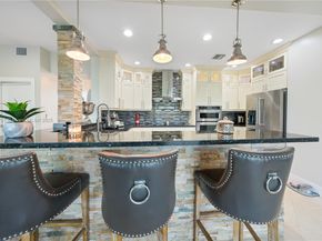 9621 W Calusa Club Dr, Miami FL 33186
