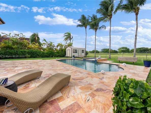 9621 W Calusa Club Dr, Miami FL 33186
