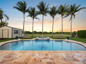 9621 W Calusa Club Dr, Miami FL 33186