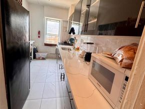 33-54 99th Street, Corona NY 11368