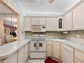 336 Pine Ridge Cir B1, Green Acres FL 33463