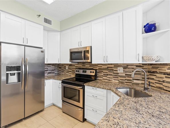 3530 Mystic Pointe Dr 102, Aventura FL 33180