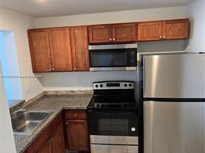 498 NW 165th St Rd D407, Miami FL 33169