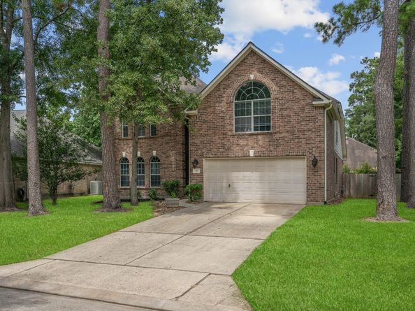 23 Murmuring Creek Place, Conroe TX 77385