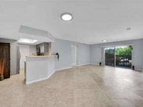 5005 Wiles Rd 203, Coconut Creek FL 33073