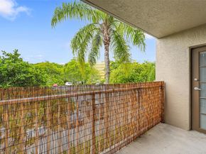 5005 Wiles Rd 203, Coconut Creek FL 33073