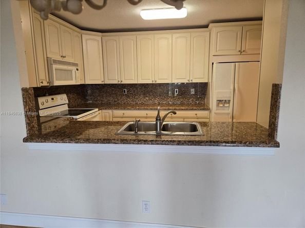 10777 W Sample Rd 1104, Coral Springs FL 33065