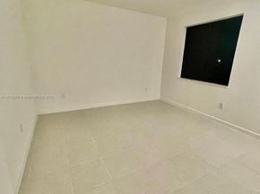 909 NE 211th St, Miami FL 33179